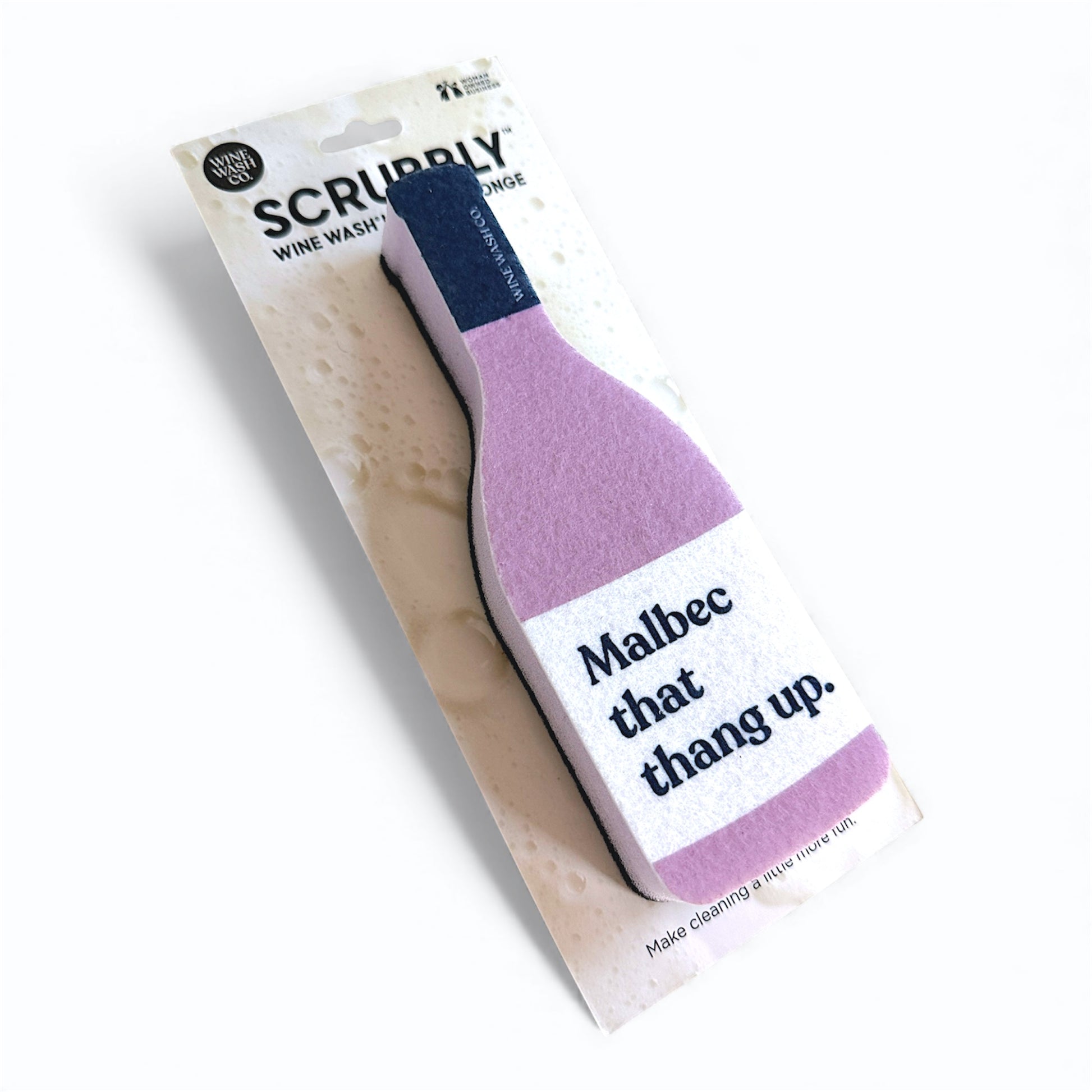 Wine bottle-shaped scrubber with 'Malbec that thing up' text on kitchen sponge