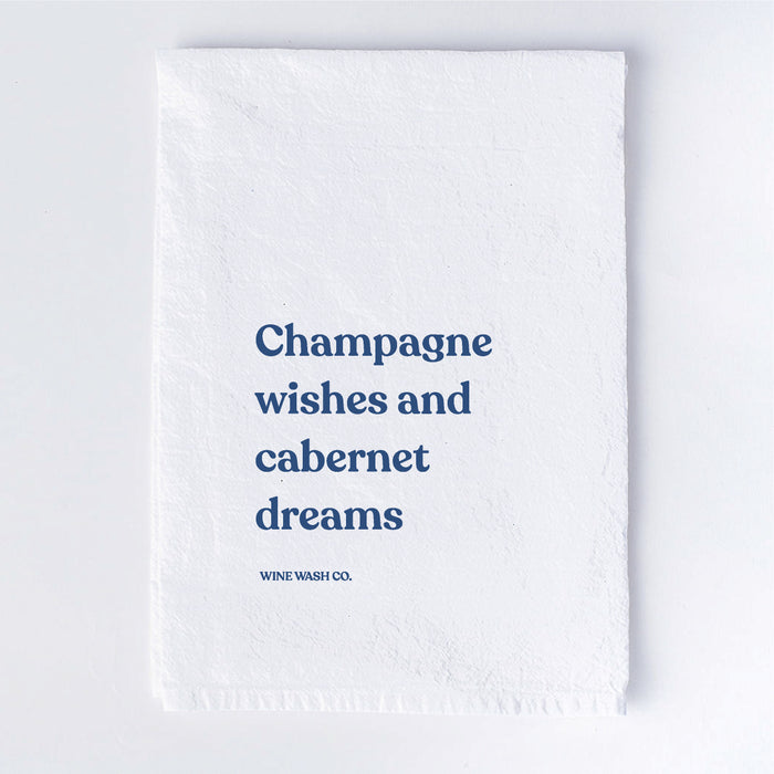 Champagne wishes and cabernet dreams. Tipsy dish kitchen towel for the tidy wine lover.