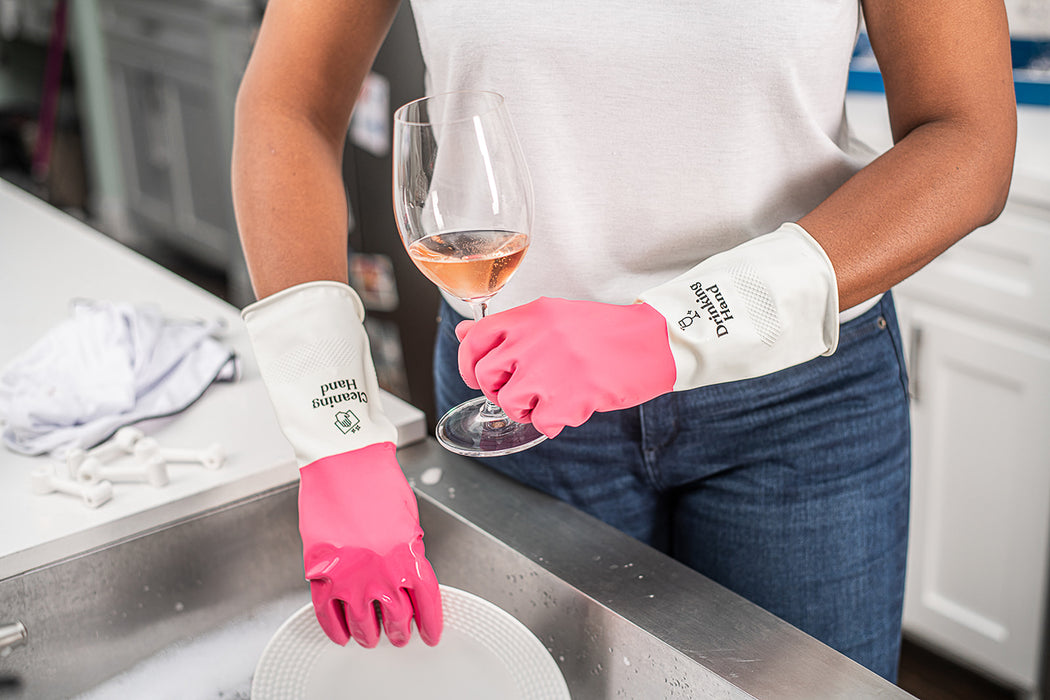 One hand for your drink, one hand for your sink! Make choring a little less boring with these reusable latex household drinking & cleaning gloves. Sized medium for a flexible fit. Gloves feature a textured pattern for better grip around your wine glass. Packaged in a branded box featuring our funny sassy mascot. Pair with a bottle of wine to make a great gift. By purchasing from Wine Wash Co., you are supporting a small woman-owned business. Cheers!