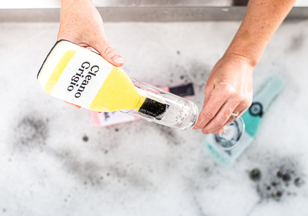 When the bottle is empty, keep your spirits up and your kitchen clean with this fun (and effective) household sponge. A scour pad lines the bottom for those extra tough spots. Sponge is approximately 7.25 x 2.5 x 1.25". Includes (1) yellow "Cleano Grigio" sponge. Makes for a great gift for the Pinot Grigio or wine lover in your life. When you shop with Wine Wash Co. you are supporting a small, woman-owned business!